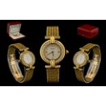 Cartier - Rivoli 18ct Gold and Diamond Set Ladies Wrist Watch. Date 1997.
