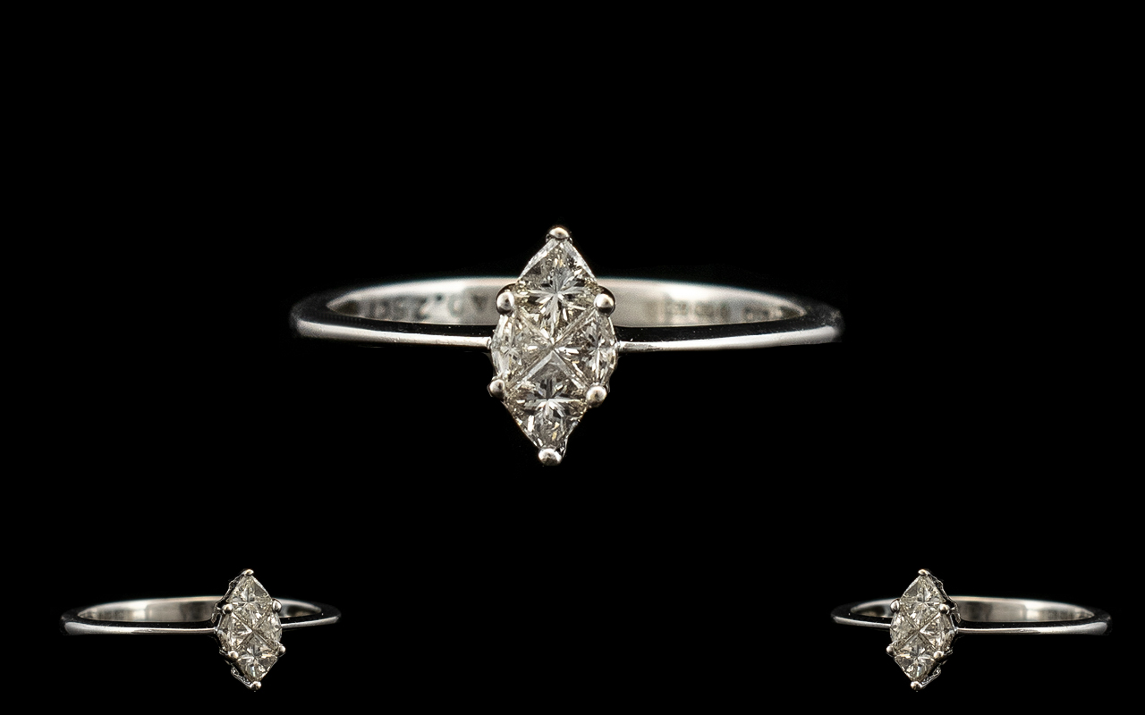 Ladies - Attractive and Petite 18ct White Gold Diamond Set Ring. Marked 750 - 18ct. The Diamonds