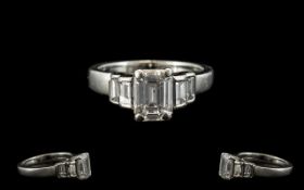 Ladies Platinum - Attractive Contemporary Designed Emerald Cut Diamond Set Dress Ring, The Central