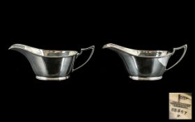 Walker and Hal Art Deco Period Pair of Sterling SIlver Sauce Boats of Pleasing Form.