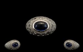 18ct White Gold Cabochon Cut Sapphire and Diamond Ring. The Cabochon Cut Sapphire of Good Colour,