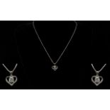 A Contemporary Silver And CZ Set Pendant Necklace Fine link chain with open heart pendant set to the