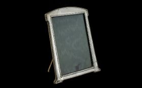 Early 20th Silver Photo Frame of Art Nouveau form hallmarked for Birmingham Q 1915.