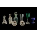 An Assorted Collection of Glasses and Small Silver Miniatures. .