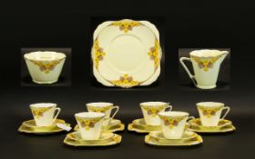 Grafton China, Art Deco Conical Shaped Tea Service "Aston" Primrose Pattern To Include Six Trios,