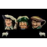 A Collection of Three Royal Doulton Toby Jugs. Comprises: 'D'Artagnan' No. D6691, 7.