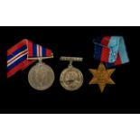 Two World War II Medals 1939-1945 Star together with a War medal.