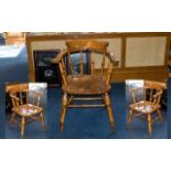 Windsor Style Chair. Kitchen armchair, spindle back, raised on four legs. Height 28" x 25".