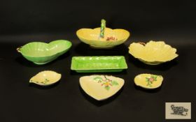 A Collection Of Carlton Ware Floral Design Ceramics Seven pieces in total to include green and
