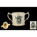 Staffordshire pottery two handled frog mug, circa 1850-60, with angular loop handles,