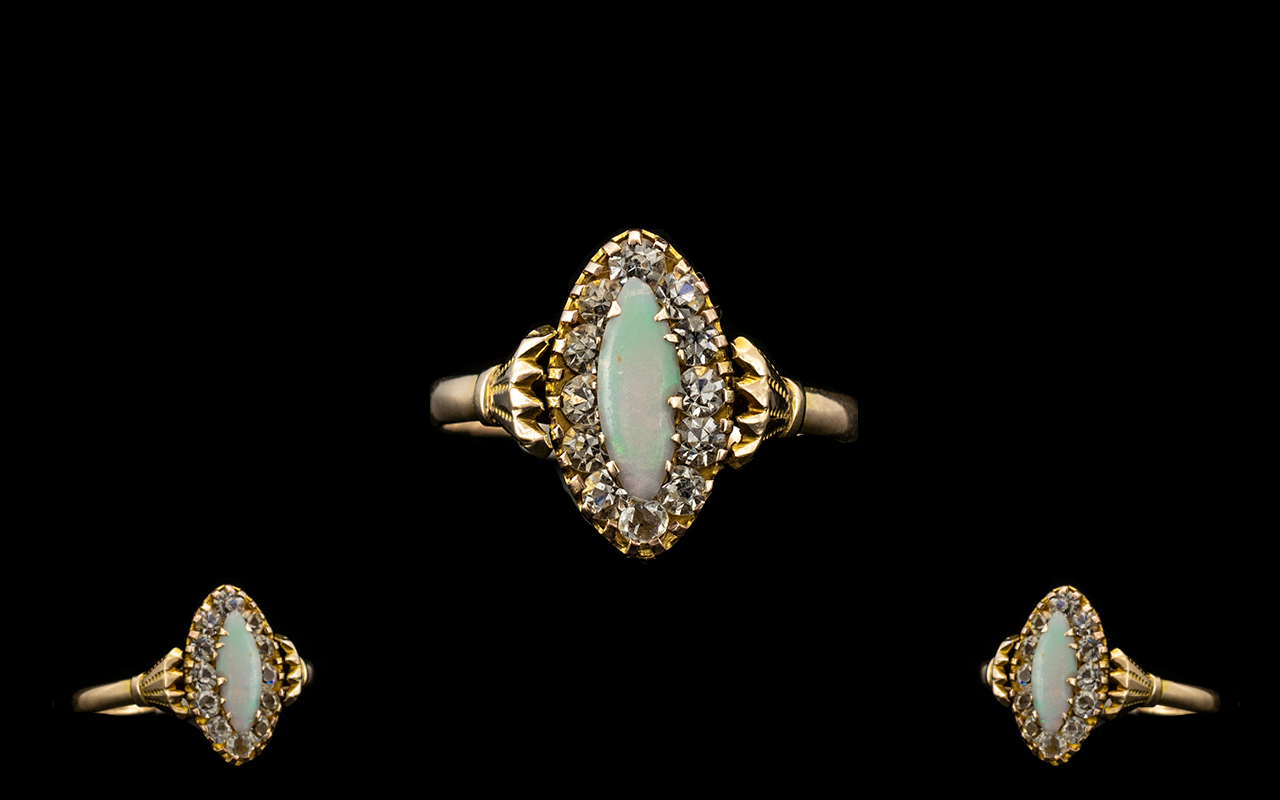 An Edwardian Period Attractive 9ct Gold Opal and Diamond Set Dress Ring, Gallery Setting.