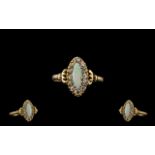 An Edwardian Period Attractive 9ct Gold Opal and Diamond Set Dress Ring, Gallery Setting.