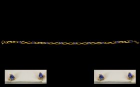 9ct Gold Bracelet Set with Tanzanite. Full Hallmarks for 9.375. 3.