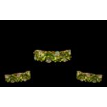 Peridot and Opal Band Ring, five marquise cut peridots, set on the diagonal,