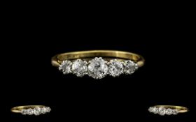 18ct Gold and Platinum Set Attractive 5 Stone Diamond Ring. c.1920's. Marked 18ct Gold and Platinum.