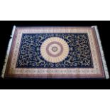 A Large Woven Silk Carpet Abusson rug with blue ground and with traditional floral and foliate