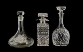 Thee Cut Glass Decanters to include a square decanter 9.