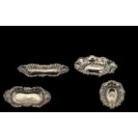 A Silver Embossed Pierced Dishes hallmarked for Birmingham F 1905 of oval shaped form with pierced