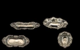 A Silver Embossed Pierced Dishes hallmarked for Birmingham F 1905 of oval shaped form with pierced