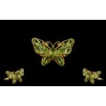 Peridot Butterfly Ring, the millgrain frame of the butterfly set with oval,