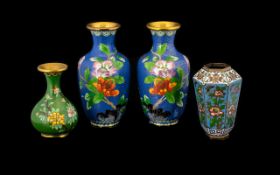 Four Assorted Cloisonne Vases, including a pair of vases decorated in blossom foliage decoration.