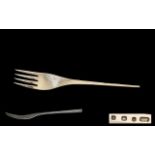 A Contemporary Designed - Large Sterling Silver Serving Fork of Pleasing Form.