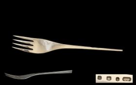 A Contemporary Designed - Large Sterling Silver Serving Fork of Pleasing Form.