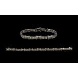 Ladies 14ct White Gold CZ Set Bracelet of Impressive Form / Design.