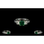 14ct White Gold Emerald and Diamond Set Dress Ring, Marked 14ct.