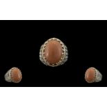 Peach Sunstone Solitaire Statement Ring, a 16ct oval cut cabochon of the sunstone, the soft peach