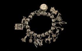 A Fine Quality Solid Silver Hearts Bracelet, Loaded with 15 Silver Charms.
