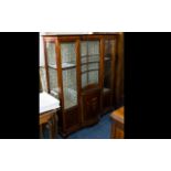 A Late 19th/Early 20th Century Glazed Display Cabinet Edwardian cabinet with central, glazed bow