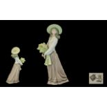 Nao by Lladro Large Hand Painted Porcelain Figurine of a Young Girl Holding a Sheaf of Wheat.