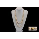 Ladies 1970's Nice Quality Double Strand Simulated Pearl Necklace of Graduated Form with a 9ct Gold