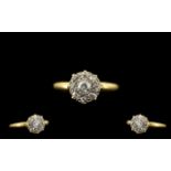 18ct Gold Diamond Set Cluster Ring of pleasing design from the 1920's. Flowerhead design excellent