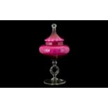 A Contemporary Glass Centrepiece Lidded dish with transparent circular base, twist stem and pink