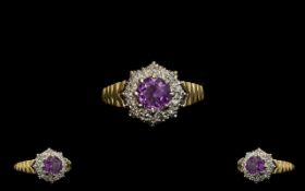 18ct Gold Attractive Amethyst and Diamond Set Cluster Ring, Flower head Setting. Marked 18ct.
