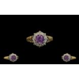 18ct Gold Attractive Amethyst and Diamond Set Cluster Ring, Flower head Setting. Marked 18ct.