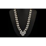 Faux Moonstone Statement Necklace, pairs of marquise shape faux moonstones form each side of the