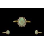 Ladies Attractive 18ct Gold Opal and Diamond Dress Ring. Fully Marked for 750 - 18ct.
