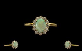 Ladies Attractive 18ct Gold Opal and Diamond Dress Ring. Fully Marked for 750 - 18ct.