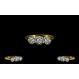 18ct Gold and Platinum 3 Stone Diamond Ring - Illusion Set. Marked 18ct - 750.