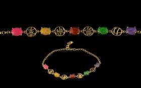 Multicoloured Jade Bracelet, an oval cabochon each of purple, pink, red,