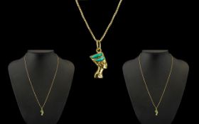 An 18ct Fine Gold Chain 2.5 grams. Plus an Egyptian Style Pendant.