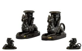 A Pair of Victorian Figural Griffin Candle Holders 4 inches in height. One A/F.