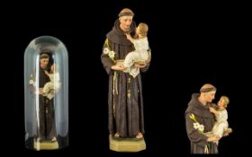 Religious Interest, A Figure of a Saint and Child, housed in a glass dome 16 inches in height.