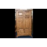 A Good Quality Solid Pine Compact Two Drawer Wardrobe with the two panelled doors opening to reveal