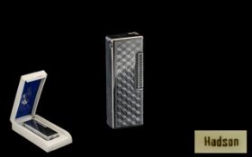 Hadson Gas Lighter in original box. Stainless steel lighter with embossed harlequin pattern.