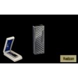 Hadson Gas Lighter in original box. Stainless steel lighter with embossed harlequin pattern.