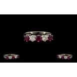 18ct White Gold - Superb Quality 5 Stone Ruby and Diamond Dress Ring. Fully Hallmarked for 18ct.